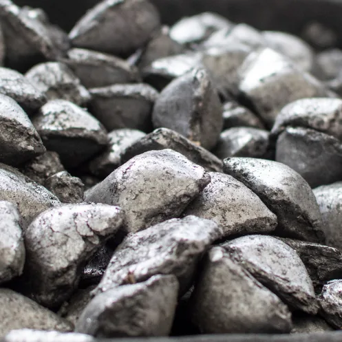 Ferroalloy material for steel production